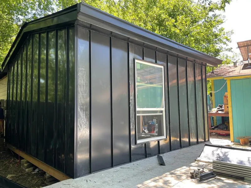 Black standing seam metal wall panels for Roof Inspection in Rexburg