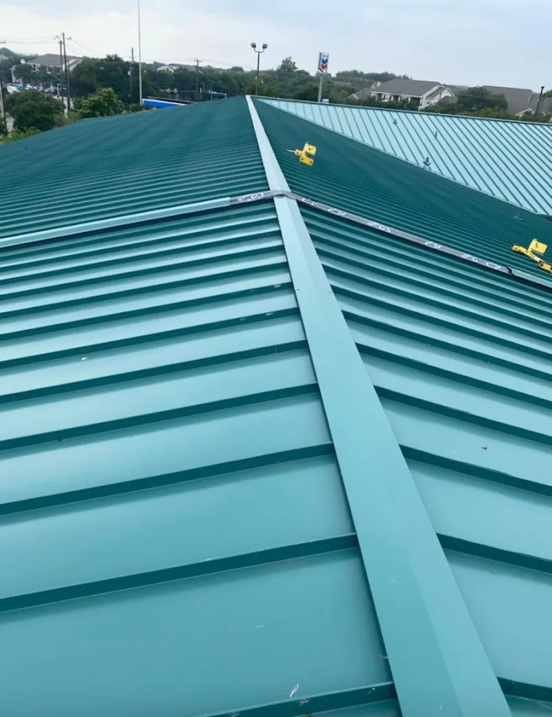 Green commercial metal roof ridge and valley for Metal Roof Repair in Rexburg