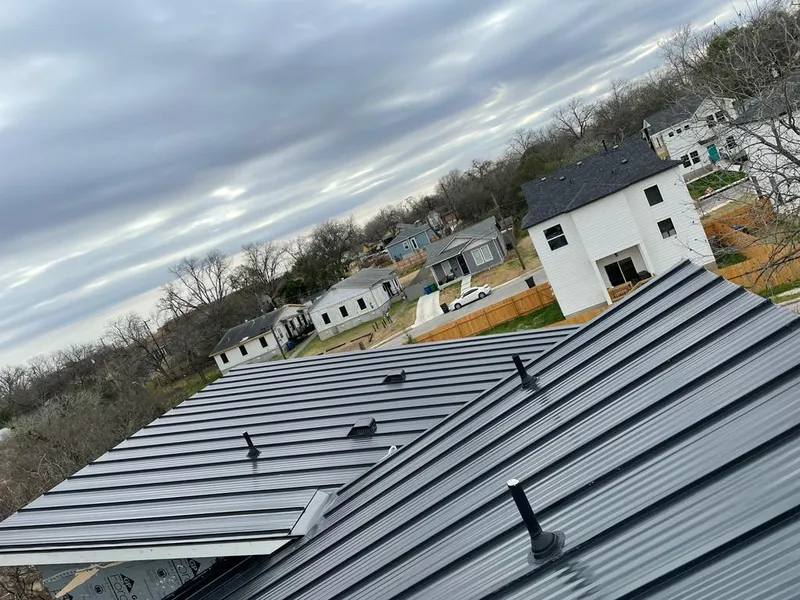 Standing seam metal roof panels with vents for Skylight Repair in Rexburg